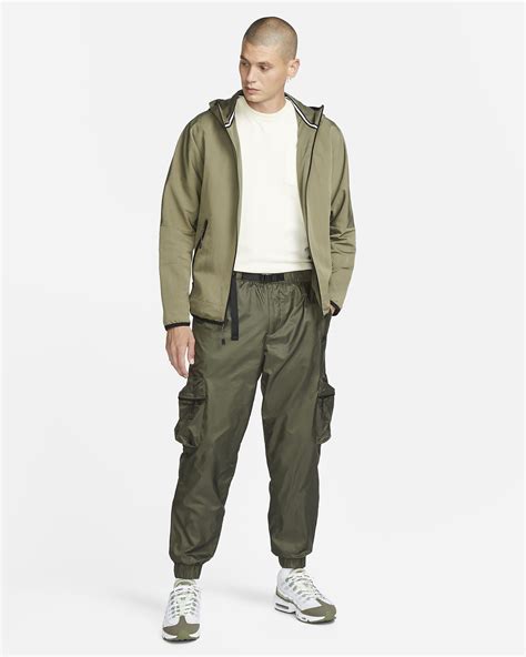 nike tech maat m|Nike tech woven pants.